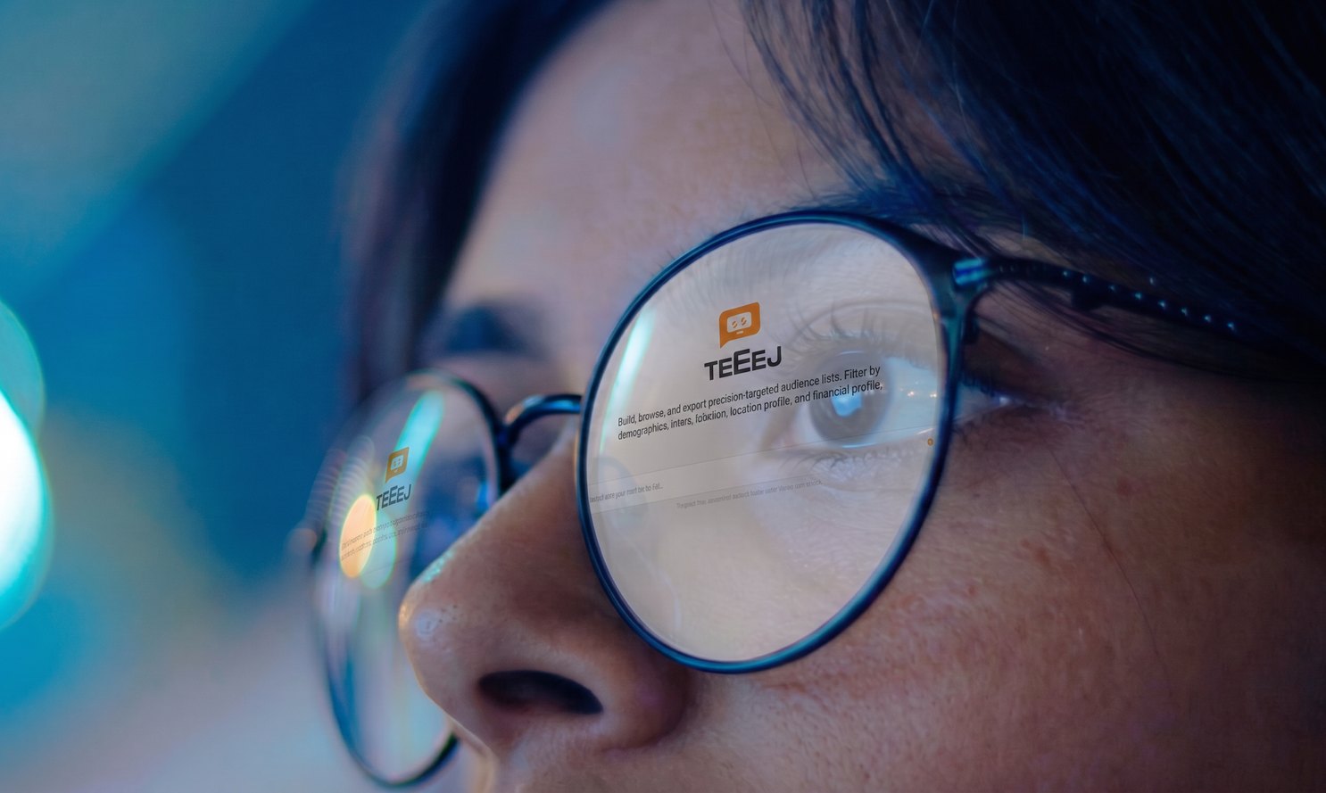 Teeej reflected in a person's glasses